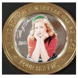 FOUR QUEENS $10 .999 SILVER GAMING TOKEN (658  V)