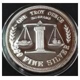 1oz .999 FINE SILVER COIN (879 L)