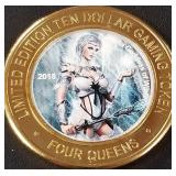 FOUR QUEENS $10 .999 SILVER GAMING TOKEN (658  Y)