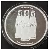 1oz .999 FINE SILVER COIN (877 F)