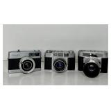 3 VINTAGE CAMERAS - MINOLTA  - OLYMPUS - ZEISS