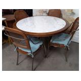 11 - ROUND TABLE WITH FOUR CHAIRS