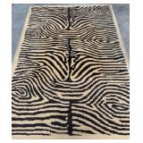 11 - ANIMAL PRINT AREA RUG 94X65'