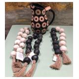 43 - DECORATIVE BEADED GARLAND AND PITCHER