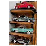 J - FOUR REPLICA COLLECTIBLE CARS (B29)