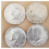 W - FOUR SILVER HALF DOLLARS (C23)