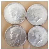 W - FOUR SILVER HALF DOLLARS (C24)