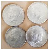 W - FOUR SILVER HALF DOLLARS (C29)