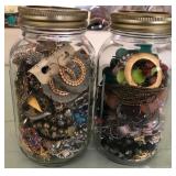 W - TWO GLASS JARS WITH COSTUME JEWELRY (L89)