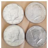 W - FOUR SILVER HALF DOLLARS (C31)