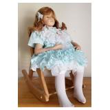 W - COLLECTIBLE DOLL WITH ROCKING CHAIR (E16)