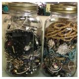 W - TWO GLASS JARS WITH COSTUME JEWELRY (L85)