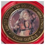 4 QUEENS CASINO - $10 .999 SILVER TOKEN (551 C60)