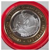 4 QUEENS CASINO - $10 .999 SILVER TOKEN (551 C63)