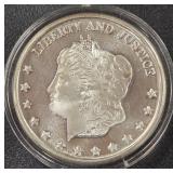 ONE TROY OUNCE .999 FINE SILVER COIN (813 J)