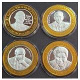 LOT OF 4 - $10  SILVER DOLLAR GAMING TOKEN (551 C)