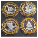 LOT OF 4 - $10  SILVER DOLLAR GAMING TOKEN (551 Y)