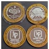 LOT OF 4 - $10  SILVER DOLLAR GAMING TOKEN (551 N)