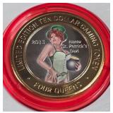 4 QUEENS CASINO - $10 .999 SILVER TOKEN (551 C66)