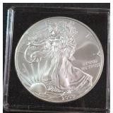 2009 - 1oz FINE SILVER ONE DOLLAR (579 U)