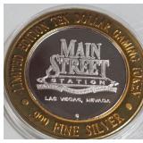 MAIN STREET - $10 .999 SILVER TOKEN (551 C86)