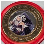 4 QUEENS CASINO - $10 .999 SILVER TOKEN (551 C56)
