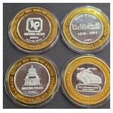 LOT OF 4 - $10  SILVER DOLLAR GAMING TOKEN (551 K)