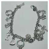 STERLING SILVER 7 INCH CHARM BRACELET 19.10GRS