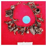 Q - STERLING SILVER CHARM BRACELET (W125)