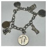 STERLING SILVER 7.50INCH CHARM BRACELET 57.40GRS