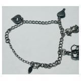 STERLING SILVER 7.50INCH CHARM BRACELET 9.60GRS