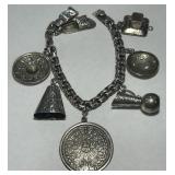 STERLING SILVER CHARM BRACELET 32.5 GRS