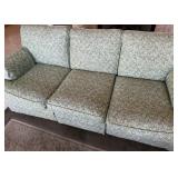 16 - THREE CUSHION UPHOLSTERED SOFA