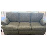 16 - THREE CUSHION UPHOLSTERED SOFA