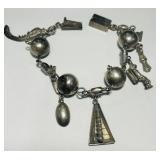 STERLING SILVER CHARM BRACELET 39.5 GRS