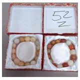 11 - TWO BEADED BRACELETS