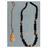 11 - TWO COSTUME JEWELRY NECKLACES (M15)