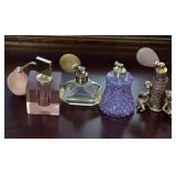 S1 - FOUR COLLECTIBLE PERFUME BOTTLES (E42)