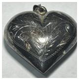 A LARGE STERLING SILVER PUFFED HEART 12.20GRS