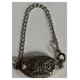 542 - STERLING SILVER DECORATIVE DECANTER TAG (D41