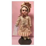 513 - ANTIQUE DOLL W/ SILK DRESS & BONNET (T272)