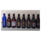 J1 - LOT OF 8 15"T BOTTLES/ COIN BANKS (B12)