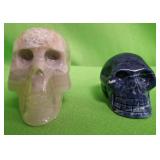 548 - TWO DECORATIVE SKULLS (A8)