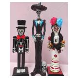 548 - THREE DAY OF THE DEAD NUTCRACKERS & FIGURINE