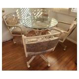 502 - ROUND GLASS-TOP TABLE WITH FOUR CHAIRS