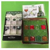 546 - TWO SETS OF WINE CHARMS (A25)