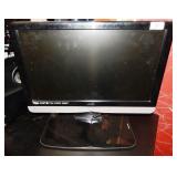 11 - 24" MOUNTED VIZIO TV