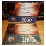 51 - 2 COLORIZED SILVER EAGLES