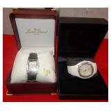 51 - PAIR OF DESIGNER WATCHES IN CASES