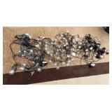 11 - STRANDS OF WHITE PATIO LIGHTS